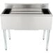A stainless steel underbar cocktail and ice bin with a post-mix cold plate and bottle holders.