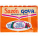 A Goya sazon seasoning packet with orange, white, and blue packaging.