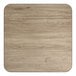 A 30-inch by 30-inch square reversible laminated table top with a white birch and ash wood grain finish.