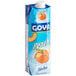 A blue and white carton of Goya Peach Nectar.