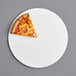 A slice of pizza on a 16" white corrugated pizza circle.