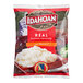 A white and green bag of Idahoan Smartmash Classic Mashed Potatoes.