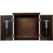 A wooden box with two doors open revealing a black and white rectangular dartboard cabinet.