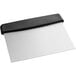 A white and black stainless steel bench scraper with a black handle.