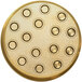 A circular gold Avancini rigatoni die with many small holes.