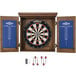 An American Legend Charleston dartboard cabinet with darts in it.