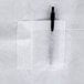 A Cordova white disposable lab coat package with a pen inside.