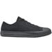 A black Shoes For Crews Delray casual shoe with laces.