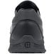 The back of a black Shoes for Crews Cater II shoe.