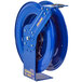 A blue metal Coxreels hose reel with yellow writing on it.