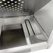 A stainless steel Paragon popcorn machine with a metal tray.
