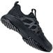 A black and grey Heather II women's non-slip athletic shoe.