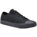 A black Shoes For Crews Delray casual shoe with laces.