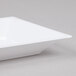 A close up of a WNA Comet white square Milan bowl.
