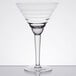 An Anchor Hocking martini glass with a clear glass and long, curved stem.