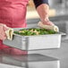 A metal Vigor steam table pan filled with broccoli and macaroni.