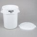 A white plastic trash can with a white plastic lid.