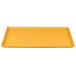 A yellow rectangular tray with a white border.