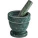 a green marble mortar and pestle