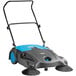 A blue and black Lavex manual sweeper with two round brushes and wheels.