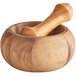 A Fox Run acacia wood mortar and pestle set with a wooden handle.