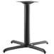 A black Lancaster Table & Seating cross table base with a standard height column.