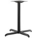 A Lancaster Table & Seating Excalibur black metal table base with a pedestal column.