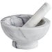 A Fox Run white marble mortar and pestle set.