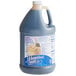 A J. Hungerford Smith jug of salted caramel syrup with a white label and blue lid.