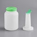 A white bottle with a green spout and cap.