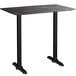 A black rectangular Lancaster Table & Seating bar height table with black legs.