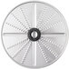 A circular metal Nemco grating/shredding disc with holes in it.