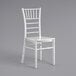 A white Lancaster Table & Seating Chiavari chair.