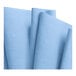 Three blue WypAll X80 industrial wipers on a white background.