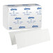 A large white box of Kleenex multi-fold paper towels.