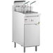 A Cooking Performance Group stainless steel open pot gas fryer with two baskets inside.