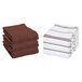 A stack of Monarch Brands brown and white stripe pattern kitchen towels.