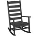 a black rocking chair with armrests