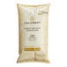 A bag of Callebaut Recipe white chocolate callets.