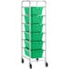 A white metal Regency lug rack with green plastic meat lugs on wheels.