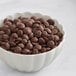 A bowl of Callebaut dark chocolate callets.