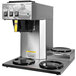A Newco commercial pourover coffee maker with three warmers.