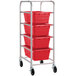 A metal Regency lug rack with four red plastic lugs on it.