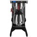 A Newco Pro Combo Thermal Server coffee maker on a stainless steel stand with a black top.