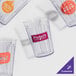 A close-up of a clear customizable plastic tumbler.