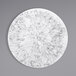 A white circular plate with a black marble embossed circle.