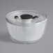 A clear plastic container with a black lid.