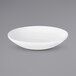 An Elite Global Solutions white melamine bowl.