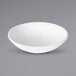 A white Elite Global Solutions melamine bowl.