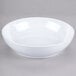 A white GET Siciliano bowl on a gray surface.